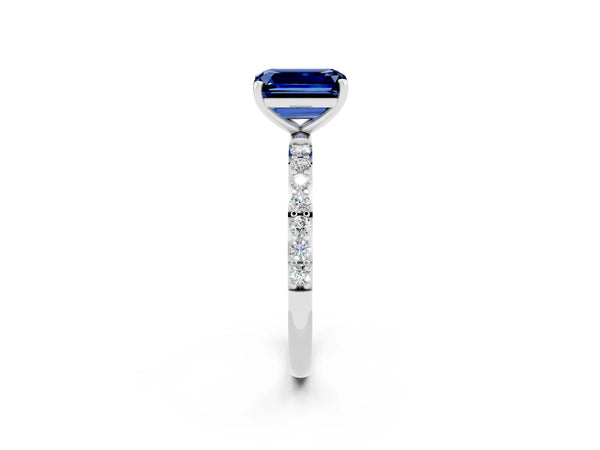 Platinum Emerald Cut Blue Sapphire Solitaire Ring with Round  Pavé Band and Prong Setting