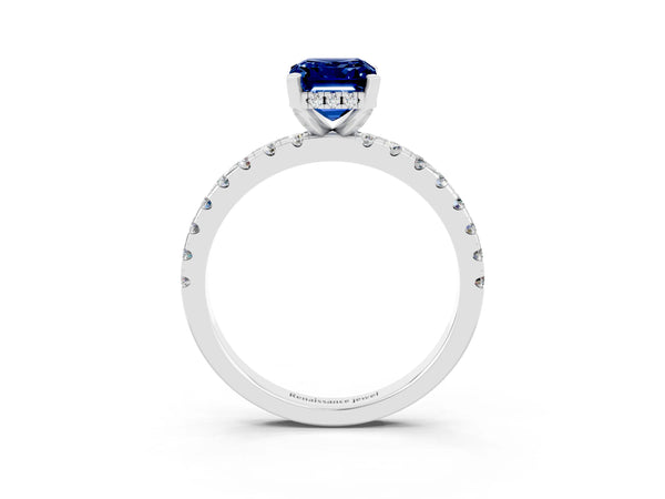 White gold Emerald Cut Blue Sapphire Solitaire Ring with Round Pavé Band and Four-Prong Setting