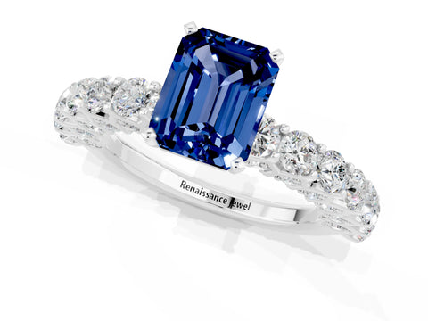 White gold Emerald Cut Blue Sapphire Solitaire Ring with Shared Prong Pavé Band and Four-Prong Setting_1