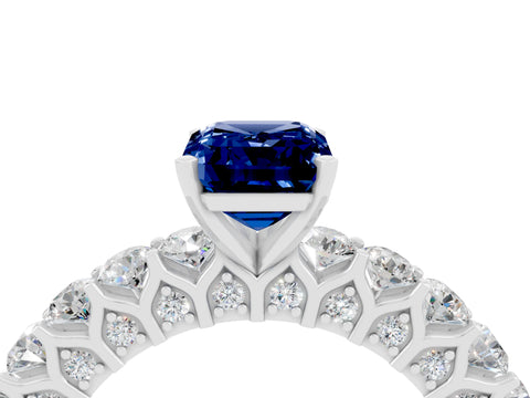 White gold Emerald Cut Blue Sapphire Solitaire Ring with Shared Prong Pavé Band and Four-Prong Setting_4