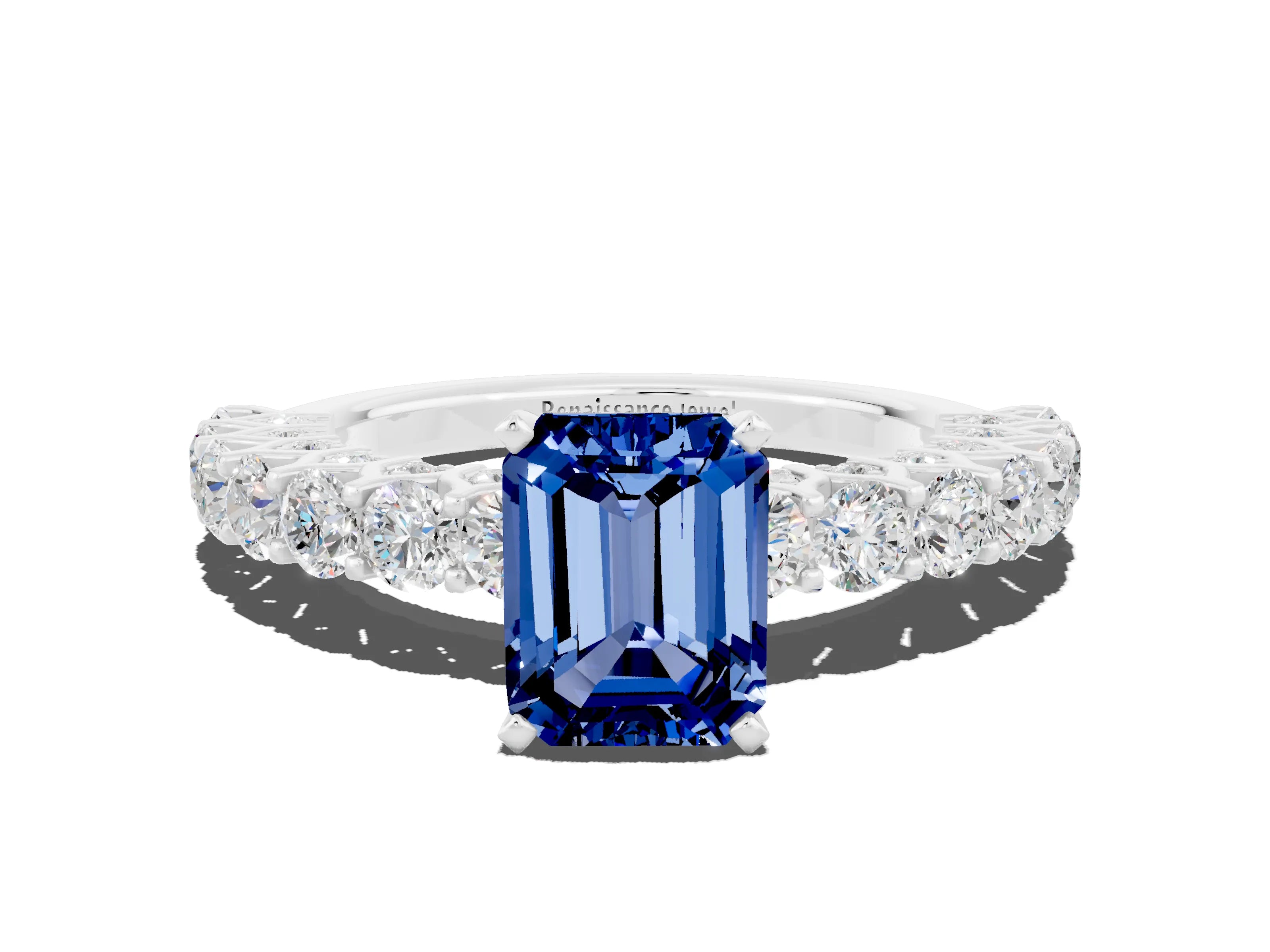 White gold Emerald Cut Blue Sapphire Solitaire Ring with Shared Prong Pavé Band and Four-Prong Setting