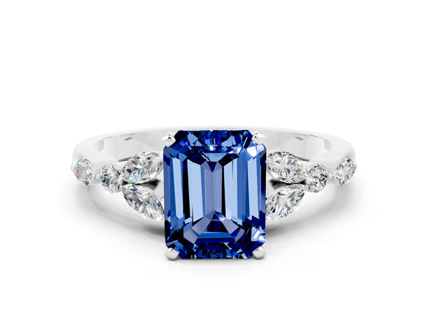 White gold Emerald Cut Blue Sapphire Solitaire Ring with Side Stones and Four-Prong Setting