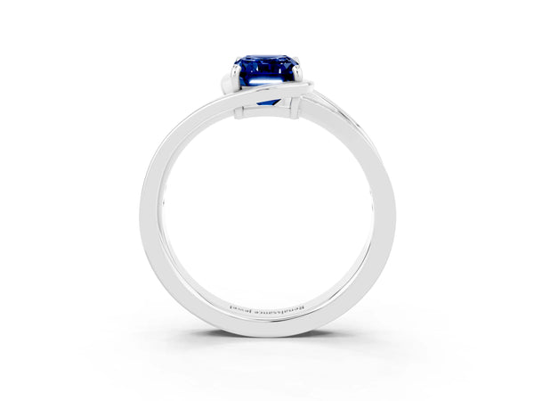 Platinum Emerald Cut Blue Sapphire Solitaire Ring with Split Shank and Prong Setting