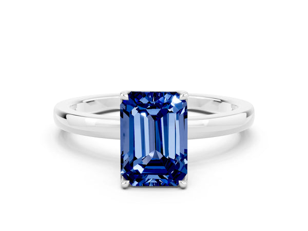 Silver Emerald Cut Blue Sapphire Solitaire Ring with Thin Band and Prong Setting