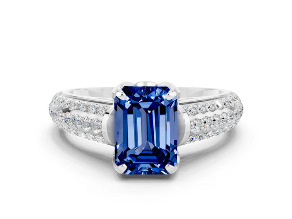Silver Emerald Cut Blue Sapphire Solitaire Ring with Three-Row Pavé Band and Four-Prong Setting