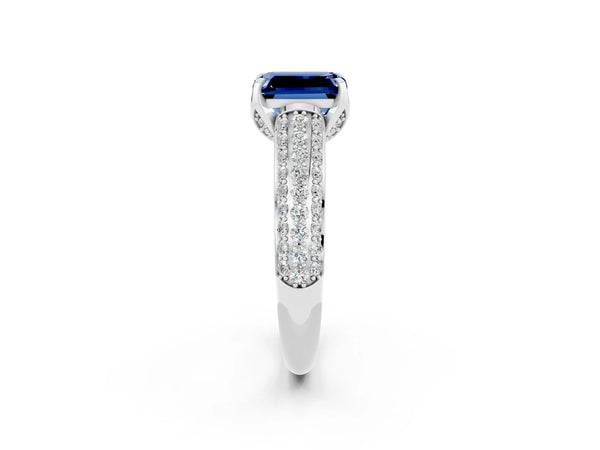 White gold Emerald Cut Blue Sapphire Solitaire Ring with Three-Row Pavé Band and Four-Prong Setting