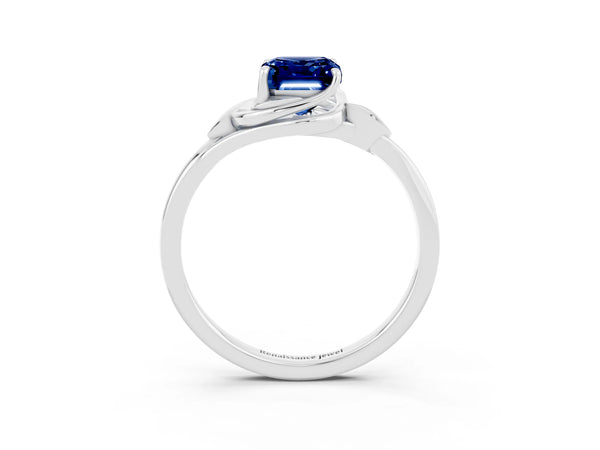 Silver Emerald Cut Blue Sapphire Solitaire Ring with Twist Band and Four-Prong Setting