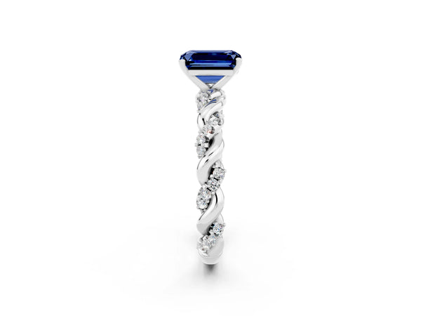 Platinum Emerald Cut Blue Sapphire Solitaire Ring with Twisted Band and Pavé Accents