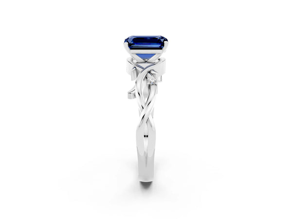 Silver Emerald Cut Blue Sapphire Solitaire Ring with Twisted Band and Prong Setting