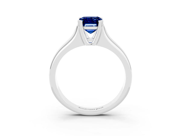 Silver Emerald Cut Blue Sapphire Solitaire Ring with Wide Band and Prong Setting