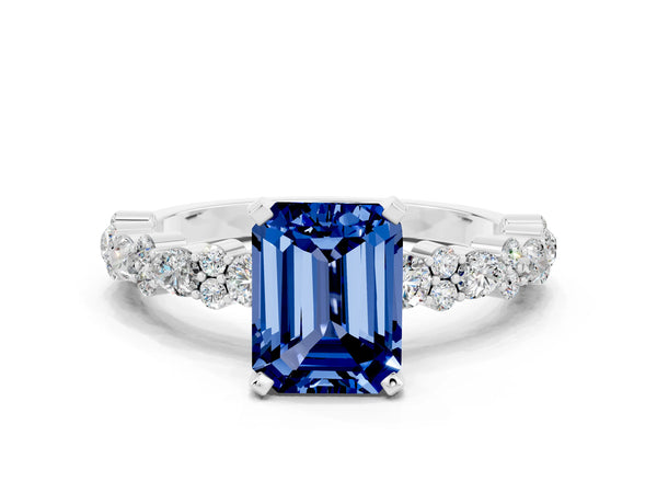 Platinum Emerald Cut Blue Sapphire Side Stone Solitaire Ring with Round  and Four-Prong Setting