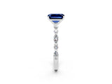 White gold Emerald Cut Blue Sapphire Solitaire with Side Stones on a Pavé Band and Four-Prong Setting_2