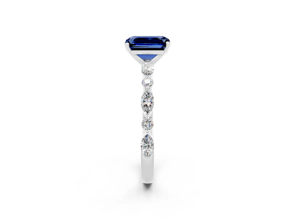 White gold Emerald Cut Blue Sapphire Ring with Marquise and Round  Side Stones and Four-Prong Setting