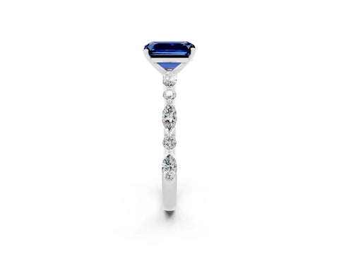 White gold Emerald Cut Blue Sapphire Solitaire with Side Stones on a Pavé Band and Four-Prong Setting_2