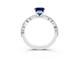 White gold Emerald Cut Blue Sapphire Solitaire with Side Stones on a Pavé Band and Four-Prong Setting_3