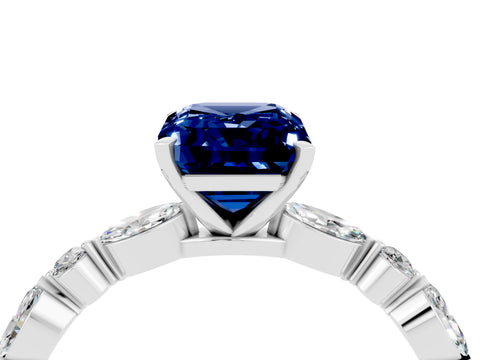 White gold Emerald Cut Blue Sapphire Solitaire with Side Stones on a Pavé Band and Four-Prong Setting_4