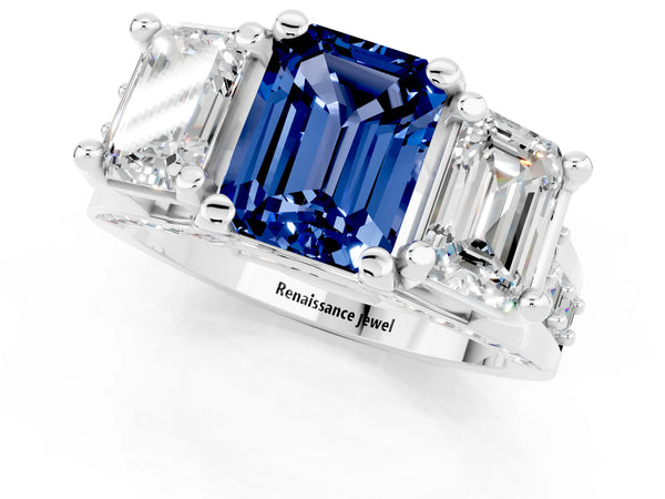 Silver Emerald Cut Blue Sapphire Three-Stone Ring with Channel Set Band and Four-Prong Setting