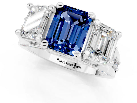 White gold Emerald Cut Blue Sapphire Three-Stone Ring with Channel Set Band and Four-Prong Setting_1