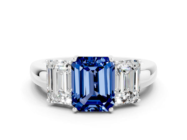 Platinum Emerald Cut Blue Sapphire Three-Stone Ring with Four-Prong Setting and Classic Band