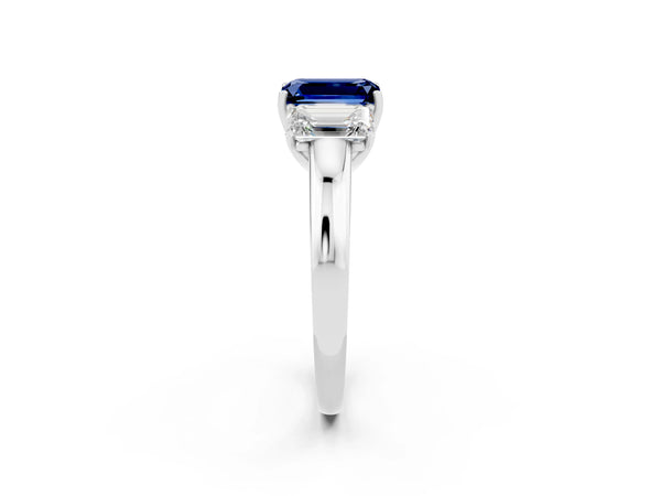 Platinum Emerald Cut Blue Sapphire Three-Stone Ring with Four-Prong Setting and Classic Band