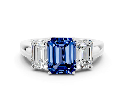 White gold Emerald Cut Blue Sapphire Three-Stone Ring with Four-Prong Setting and Classic Band