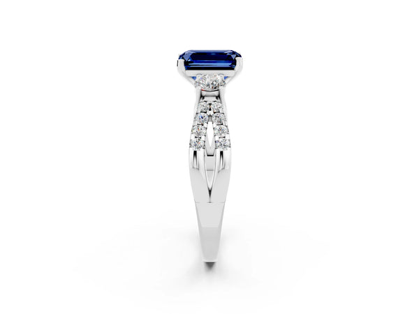 Platinum Emerald Cut Blue Sapphire Three-Stone Ring with Pavé Split Shank and Four-Prong Setting