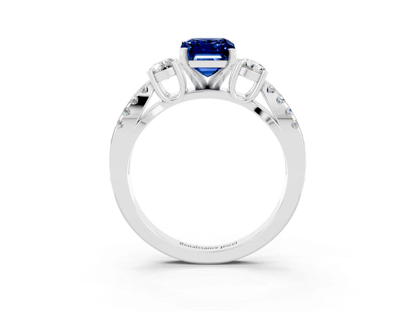 Platinum Emerald Cut Blue Sapphire Three-Stone Ring with Pavé Split Shank and Four-Prong Setting