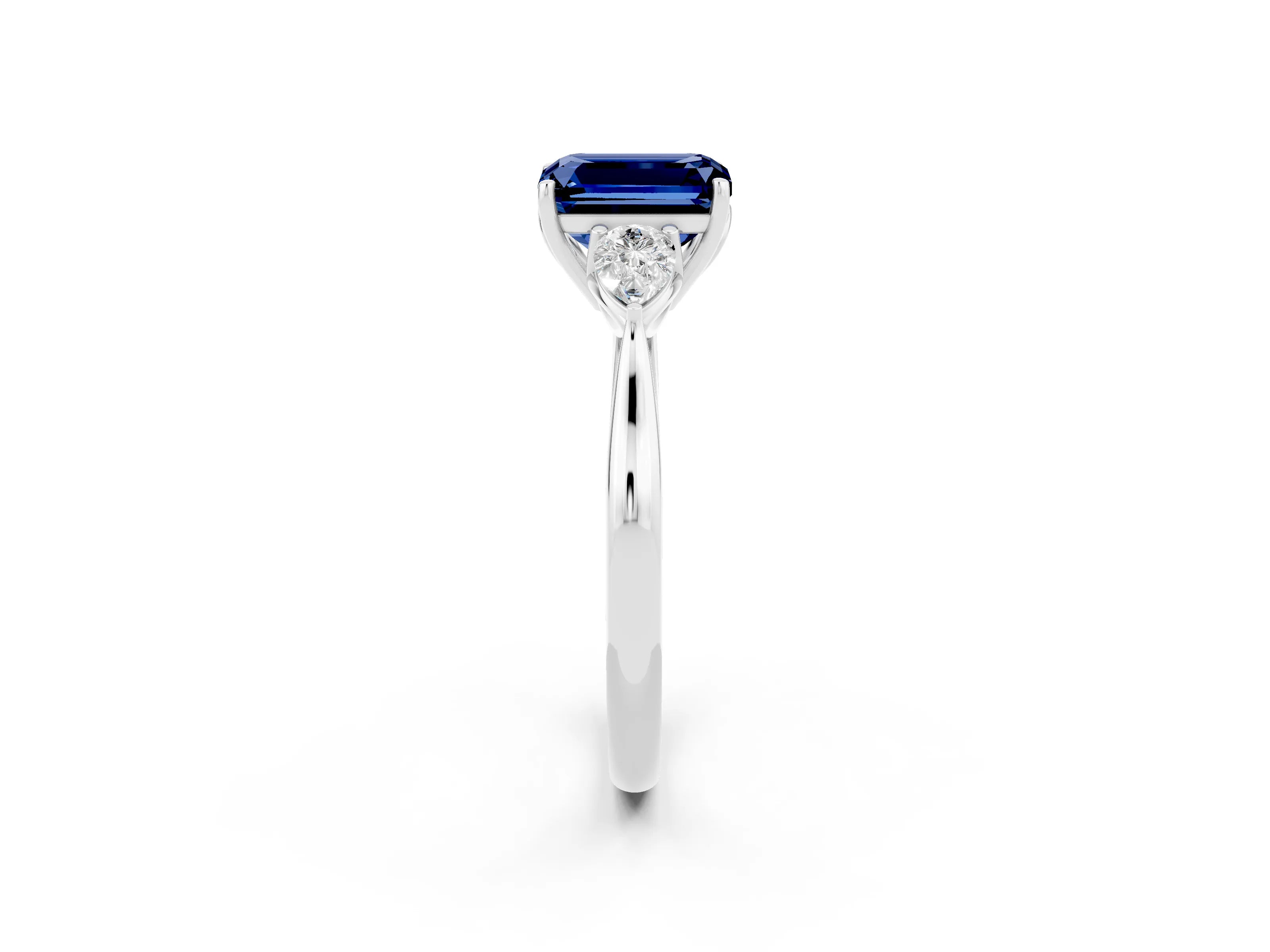 White gold Emerald Cut Blue Sapphire Three-Stone Ring with Pear Side Stones and Four-Prong Setting_14