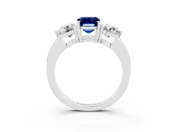 White gold Emerald Cut Blue Sapphire Three-Stone Ring with Prong Setting and Classic Band