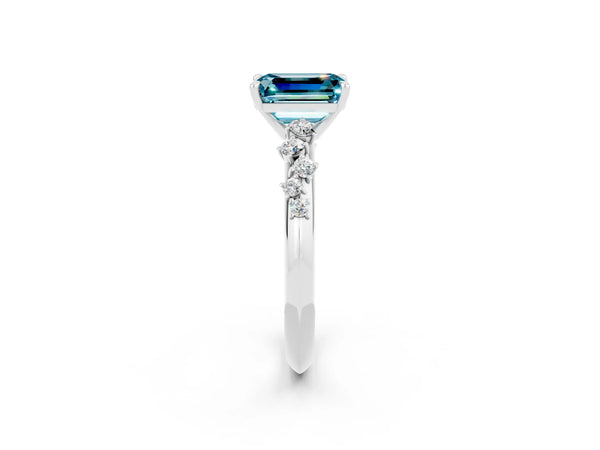Platinum Emerald Cut Blue Topaz Graduated Cluster Solitaire Engagement Ring with Open Basket