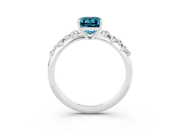 Platinum Emerald Cut Blue Topaz Graduated Cluster Solitaire Engagement Ring with Open Basket