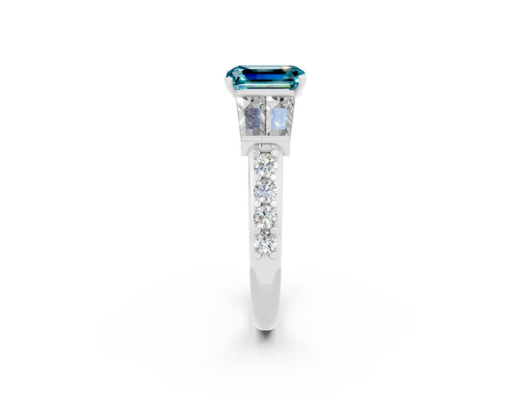 Silver Emerald Cut Blue Topaz Engagement Ring with Baguette Side Stones and Channel Set Band
