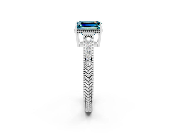 Silver Emerald Cut Blue Topaz Engagement Ring with Milgrain Channel Set Band and Prong Setting