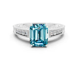 White gold Emerald Cut Blue Topaz Engagement Ring with Milgrain Channel Set Band and Prong Setting
