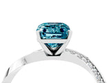 White gold Emerald Cut Blue Topaz Engagement Ring with Side Stone Accents and Four-Prong Setting_40