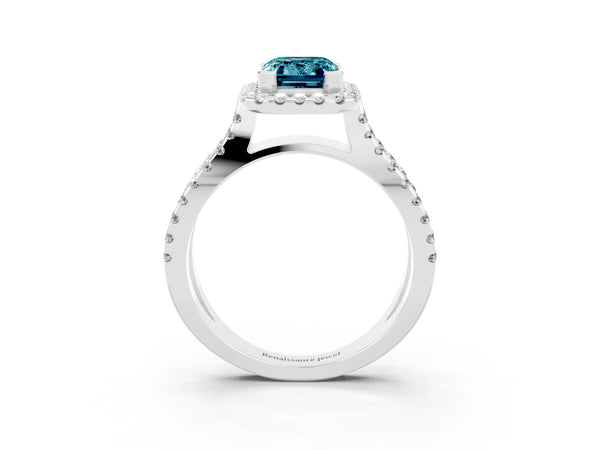 Platinum Emerald Cut Blue Topaz Halo Ring with Split Shank Pavé Band and Prong Setting
