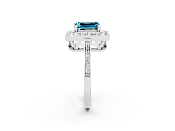 Platinum Emerald Cut Blue Topaz Halo Ring with Split Shank and Four-Prong Setting
