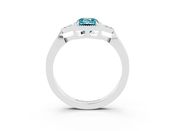 Silver Emerald Cut Blue Topaz Halo Ring with Tapered Band and Four-Prong Setting