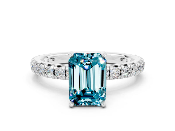 Platinum Emerald Cut Blue Topaz Pavé Solitaire Ring with Round Band and Prong Setting