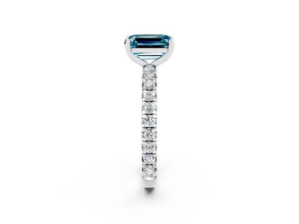 Platinum Emerald Cut Blue Topaz Pavé Solitaire Ring with Round Band and Prong Setting
