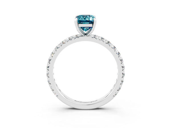 Platinum Emerald Cut Blue Topaz Pavé Solitaire Ring with Round Band and Prong Setting