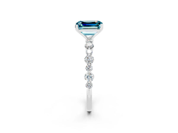 Platinum Emerald Cut Blue Topaz Prong Set Engagement Ring with Pavé Band