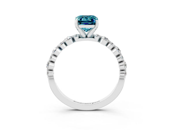 White gold Emerald Cut Blue Topaz Prong Set Engagement Ring with Pavé Band