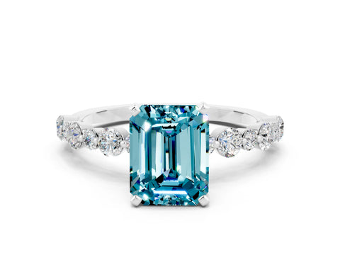 White gold Emerald Cut Blue Topaz Prong Set Engagement Ring with Pavé Band