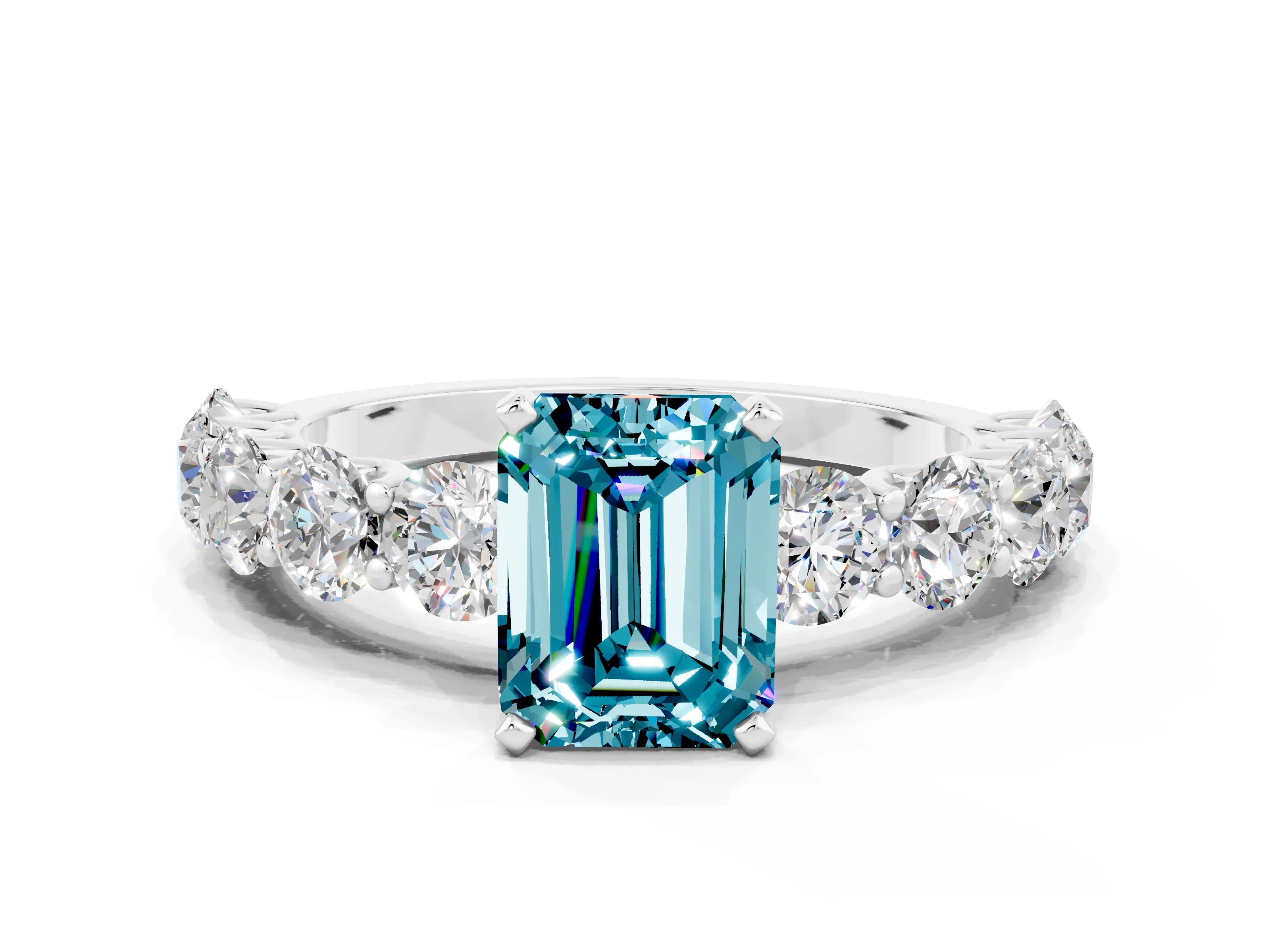 White gold Emerald Cut Blue Topaz Prong Setting with Side Stones on a Pave Band