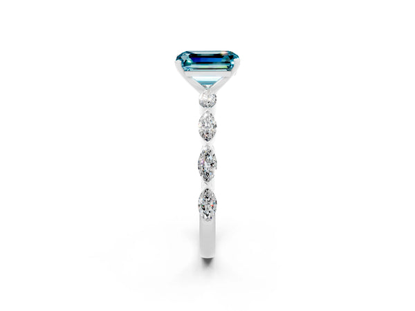 Silver Emerald Cut Blue Topaz Ring with Marquise Side Stones and Prong Setting