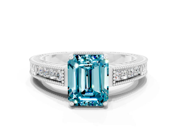 Platinum Emerald Cut Blue Topaz Ring with Milgrain Pavé Band and Four-Prong Setting