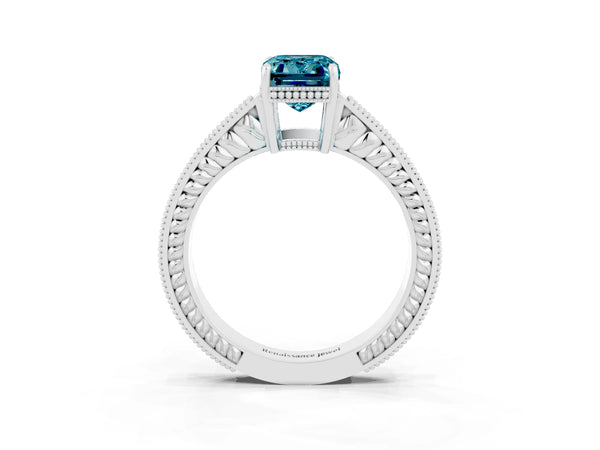 Silver Emerald Cut Blue Topaz Ring with Milgrain Pavé Band and Four-Prong Setting