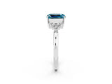 White gold Emerald Cut Blue Topaz Ring with Side Stones and Four-Prong Setting_38
