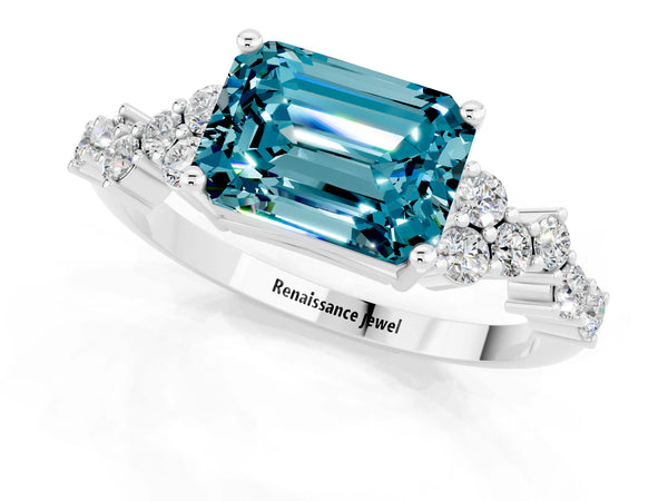 White gold Emerald Cut Blue Topaz Scattered Round Accent Ring with Prong Setting